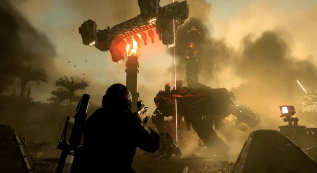 A Helldivers 2 Factory Strider being dropped off by a drop ship as a Helldiver watches