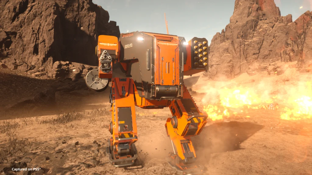 A exosuit from Helldivers 2 with the vehicle skin from the Freedom's Flame Warbond
