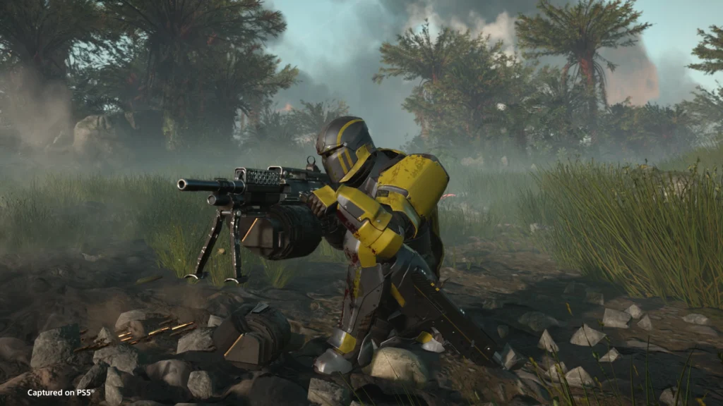 The Amazing Helldivers 2 Stalwart And Its Family 3 A Helldiver bracing themself to fire the Heavy Machine Gun