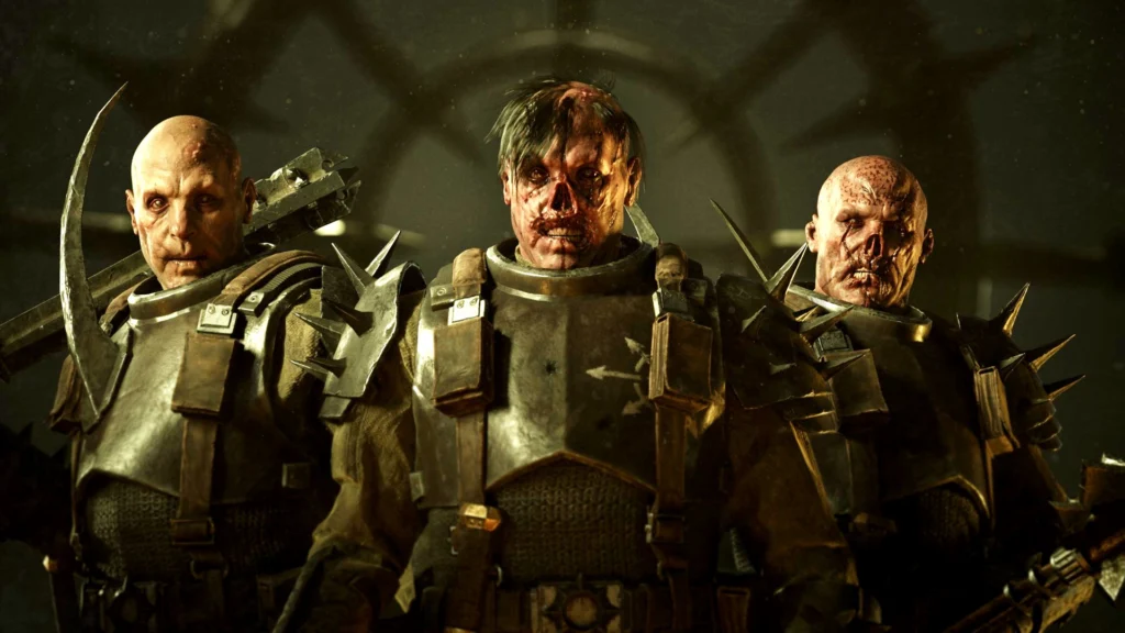 The Darktide Bound By Duty Update Arrives With Additions To Fulfill Your Honorable Duty 3 Three soldiers of the Moebian 6th in Darktide lookin at the camera