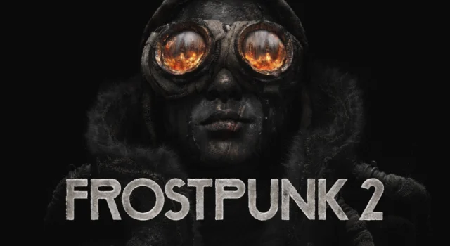 The cover of Frostpunk 2 featuring a man wearing a coat and goggles cover in soot lookin up at a fire
