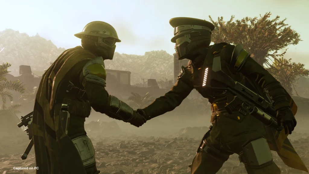 Two Helldivers shaking hands while wearing the gear from the latest Warbond from the Helldivers 2 content roadmap