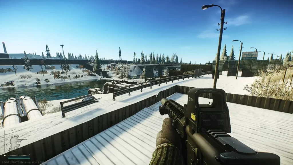 A PMC holding onto an AR with attachments that recently got changed in the Escape from Tarkov 1.0.4.5 patch while standing in a snowy Customs