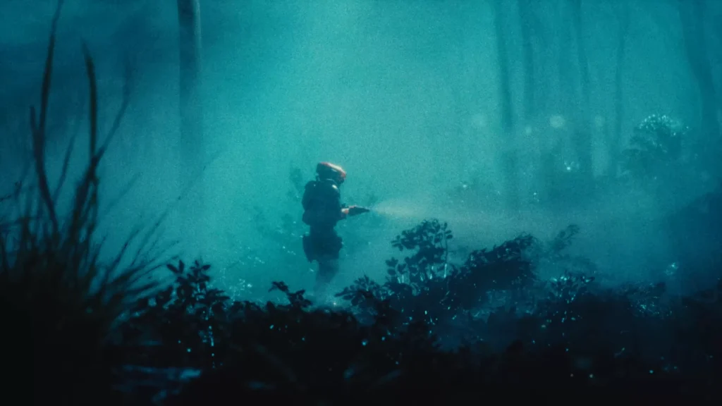 The new Runner Shell, Sentinel, standing in an open area in the Night Dire Marsh map, alone