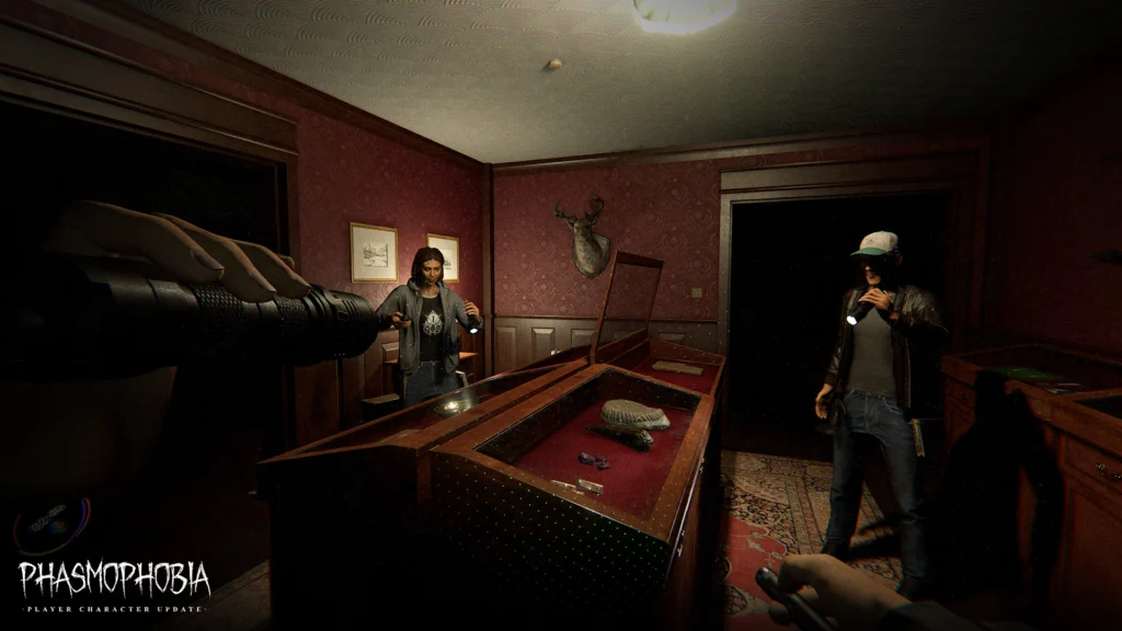 Three players with brand new their new clothes and players models in the Phasmophobia Player Character update standing in a bright room