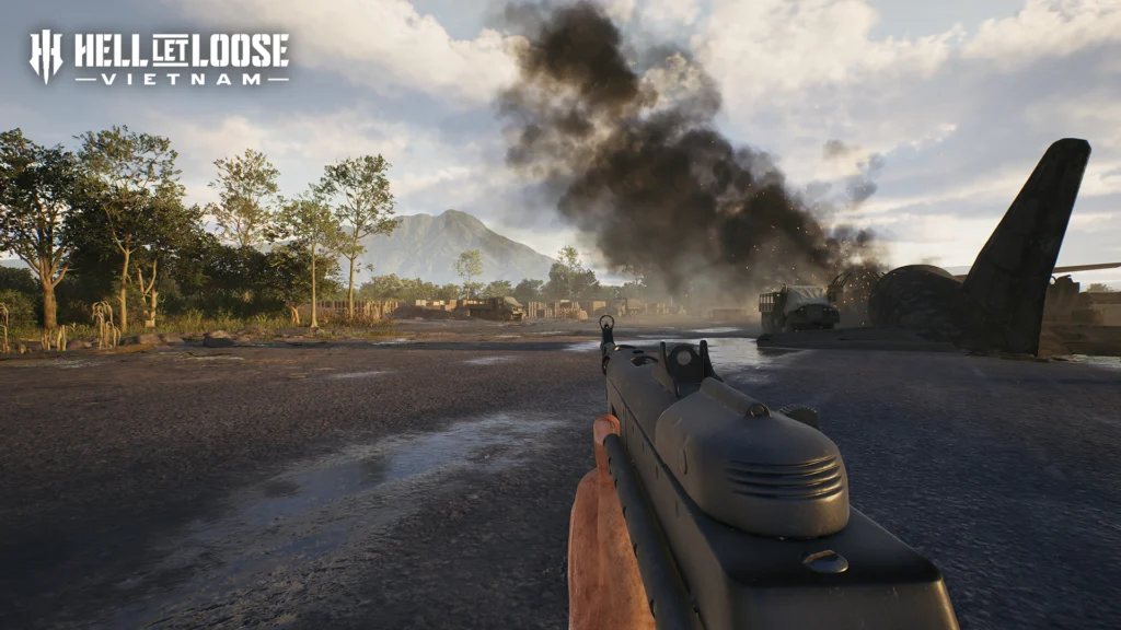 The Hell Let Loose: Vietnam Crossplay Playtest And How You Can Join For Absolutely Free 3 A soldier walking around an airfield with a weapon in hand