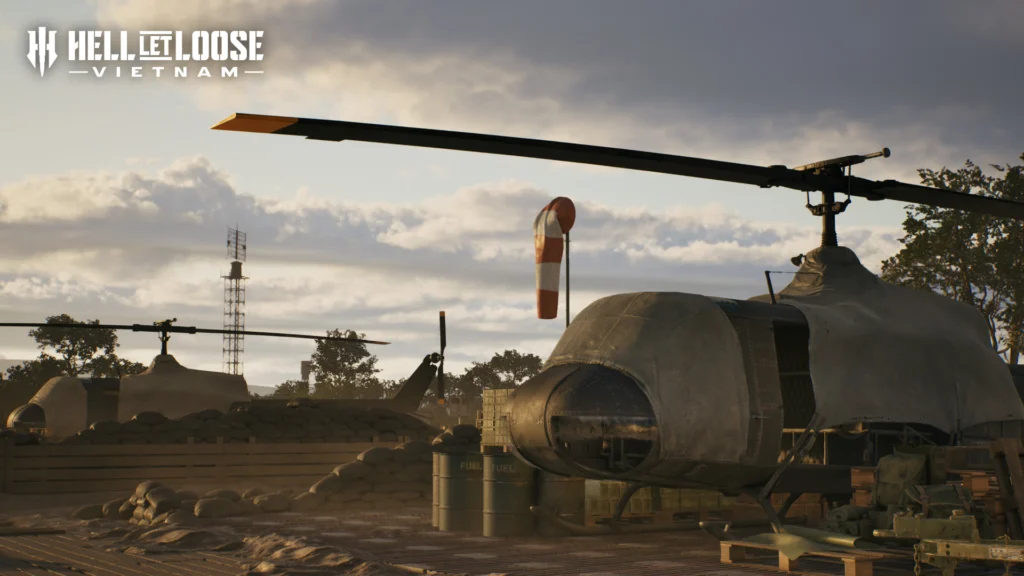 The Hell Let Loose: Vietnam Crossplay Playtest And How You Can Join For Absolutely Free 2 Two stored Huey helicopters on the new Đắk Tô Airfield map