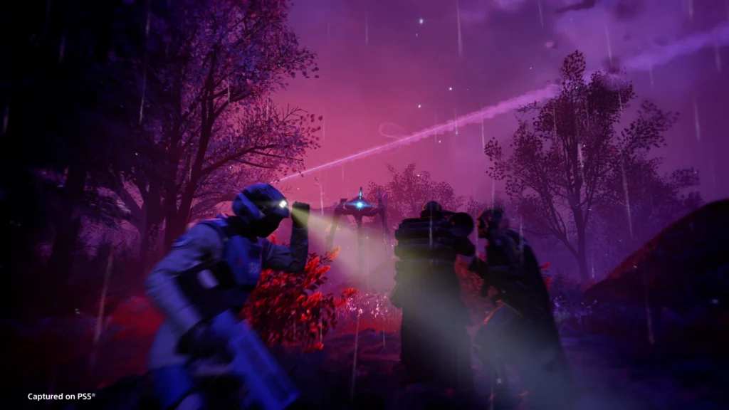 Two Helldivers and a single SEAF soldier engaging an Illuminate Harvester 
